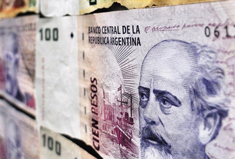 Pesos argentinos emisión monetaria déficit inflación
