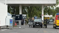 Tensión en Godoy Cruz: una policía se atrincheró en una estación de servicio Tensión en Godoy Cruz: una policía se atrincheró en una estación de servicio
