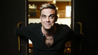 Robbie Williams y una impresionante transformación
